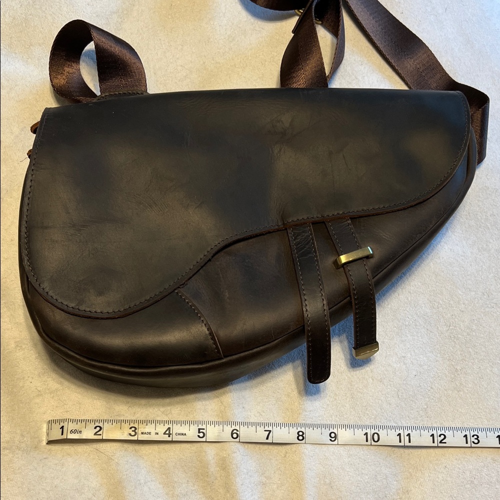 Brown leather saddle bag